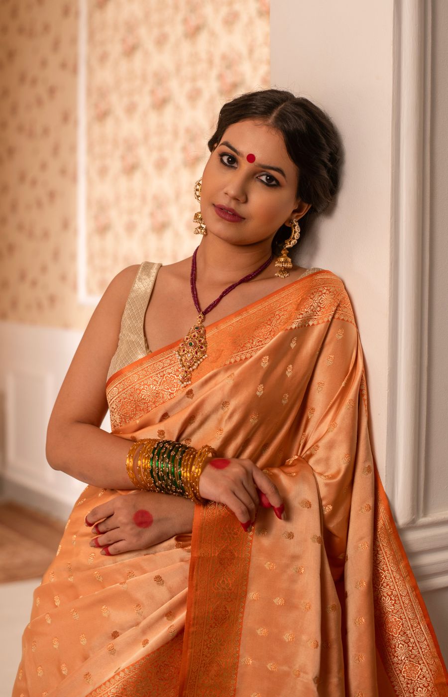 Peachish Orange Mushru Silk Saree with Contrasting Orange Kadwa Border