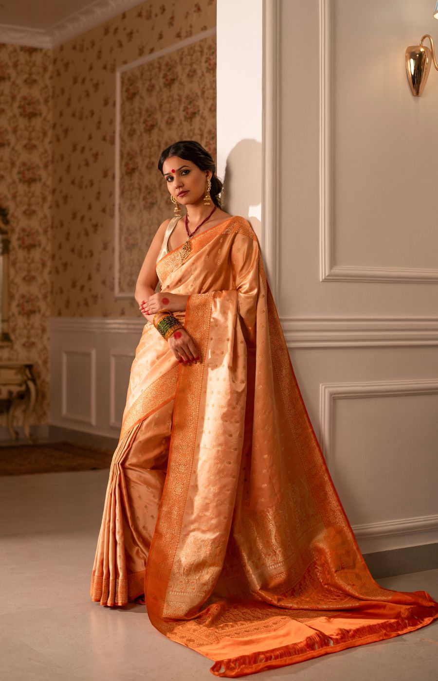 Peachish Orange Mushru Silk Saree with Contrasting Orange Kadwa Border