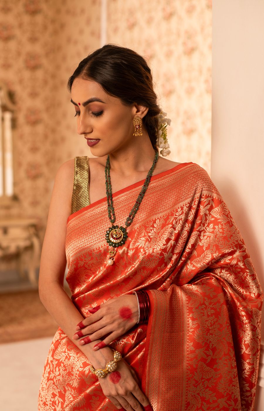 Vibrant Orange Banarasi Brocade Saree with Gold Zari Weaving