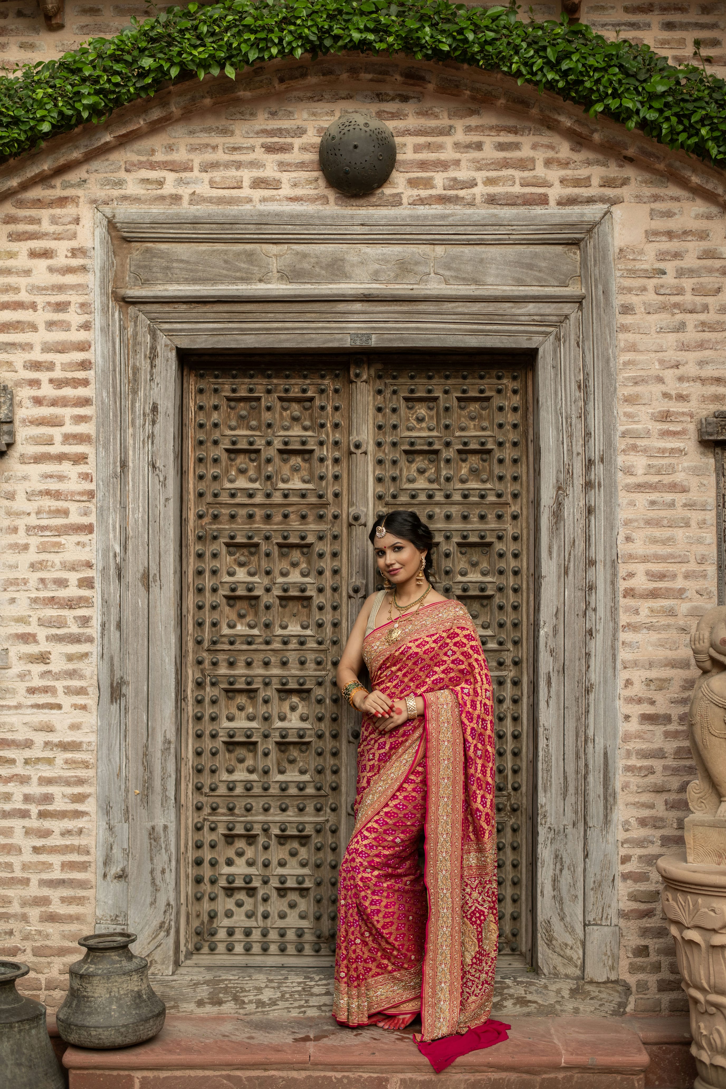 Radiant Banarasi Georgette Bandhani Gharchola Saree with Exquisite Hand Embroidery