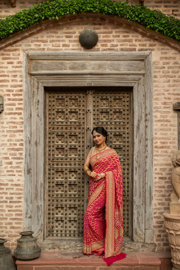 Radiant Banarasi Georgette Bandhani Gharchola Saree with Exquisite Hand Embroidery