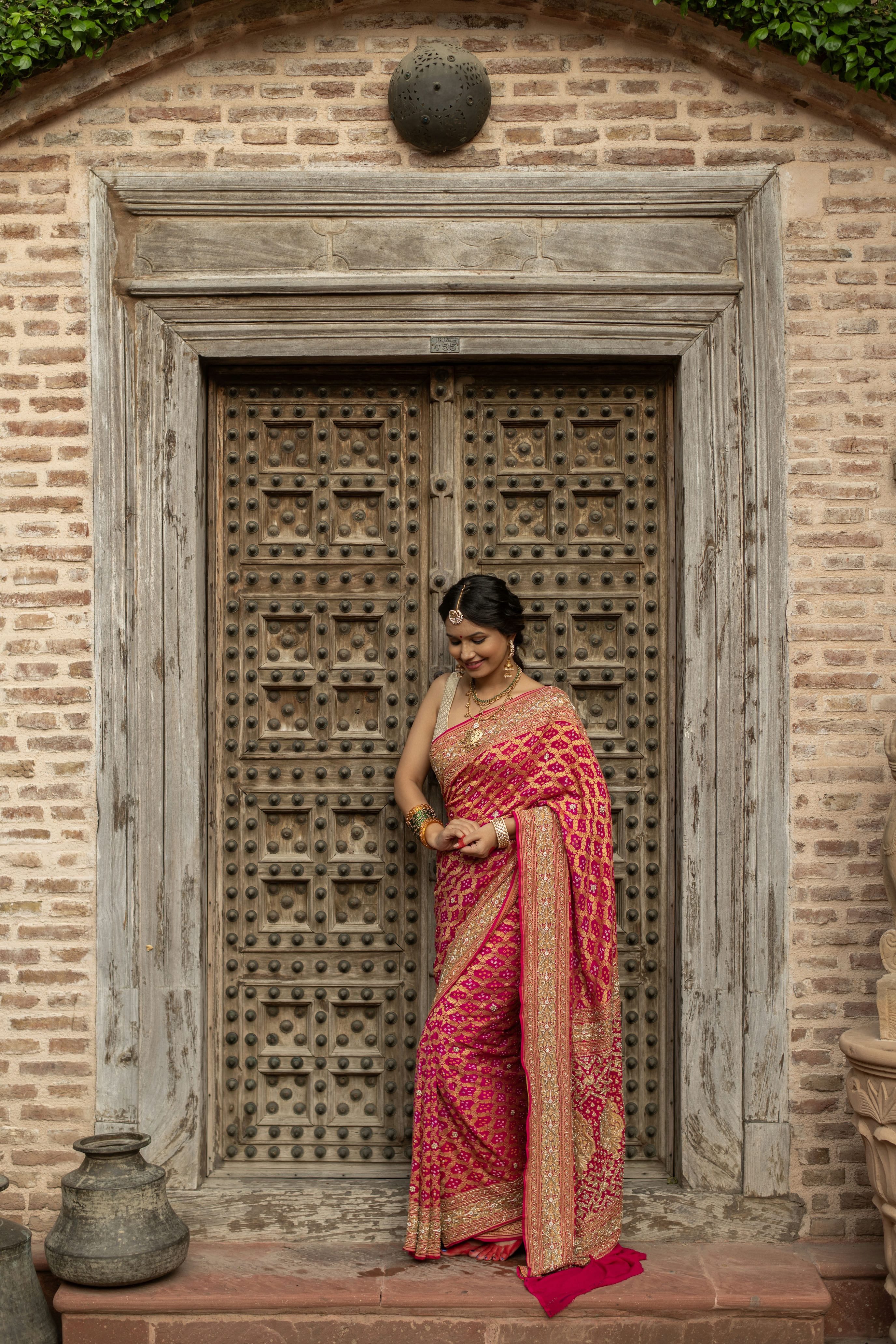 Radiant Banarasi Georgette Bandhani Gharchola Saree with Exquisite Hand Embroidery