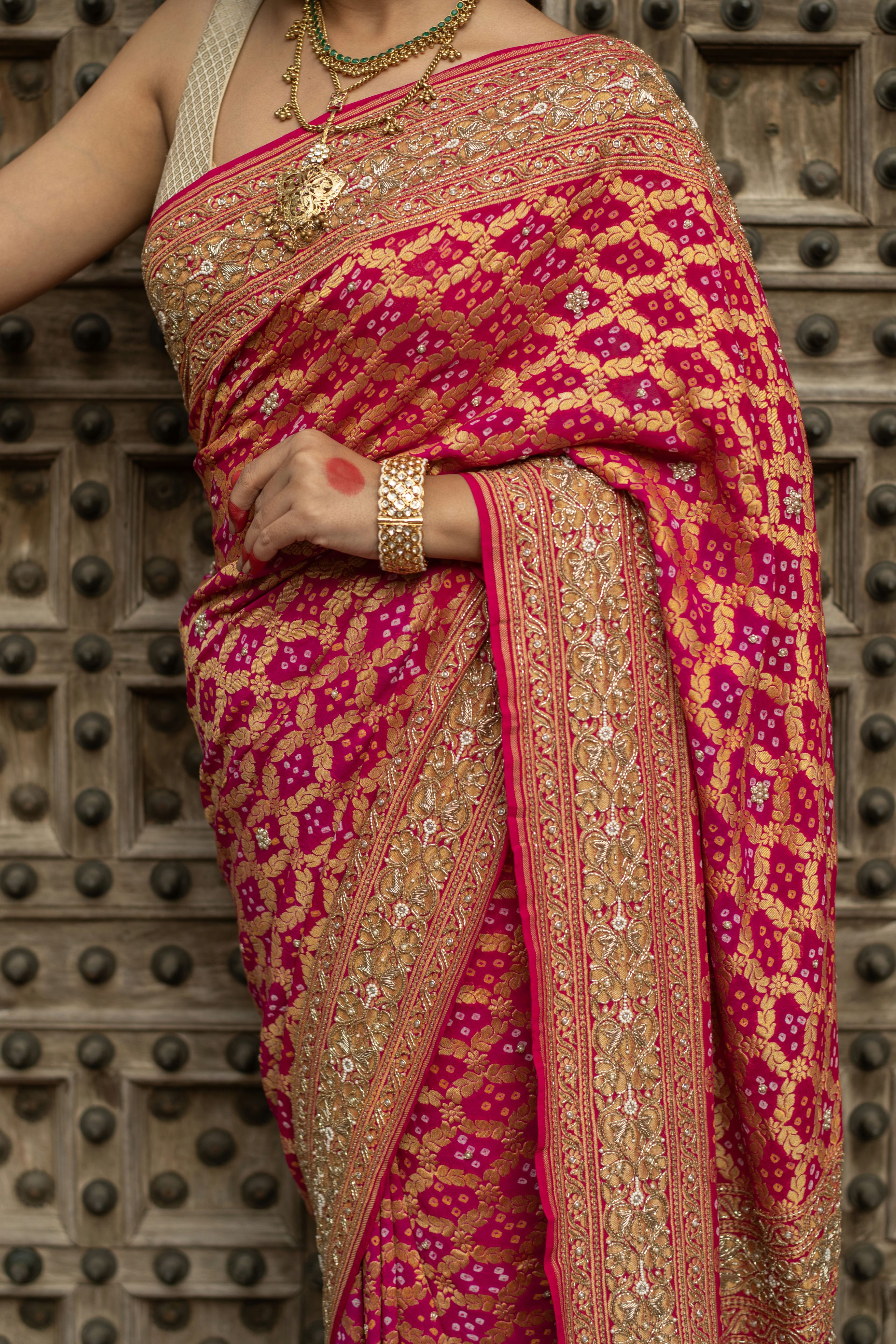 Radiant Banarasi Georgette Bandhani Gharchola Saree with Exquisite Hand Embroidery