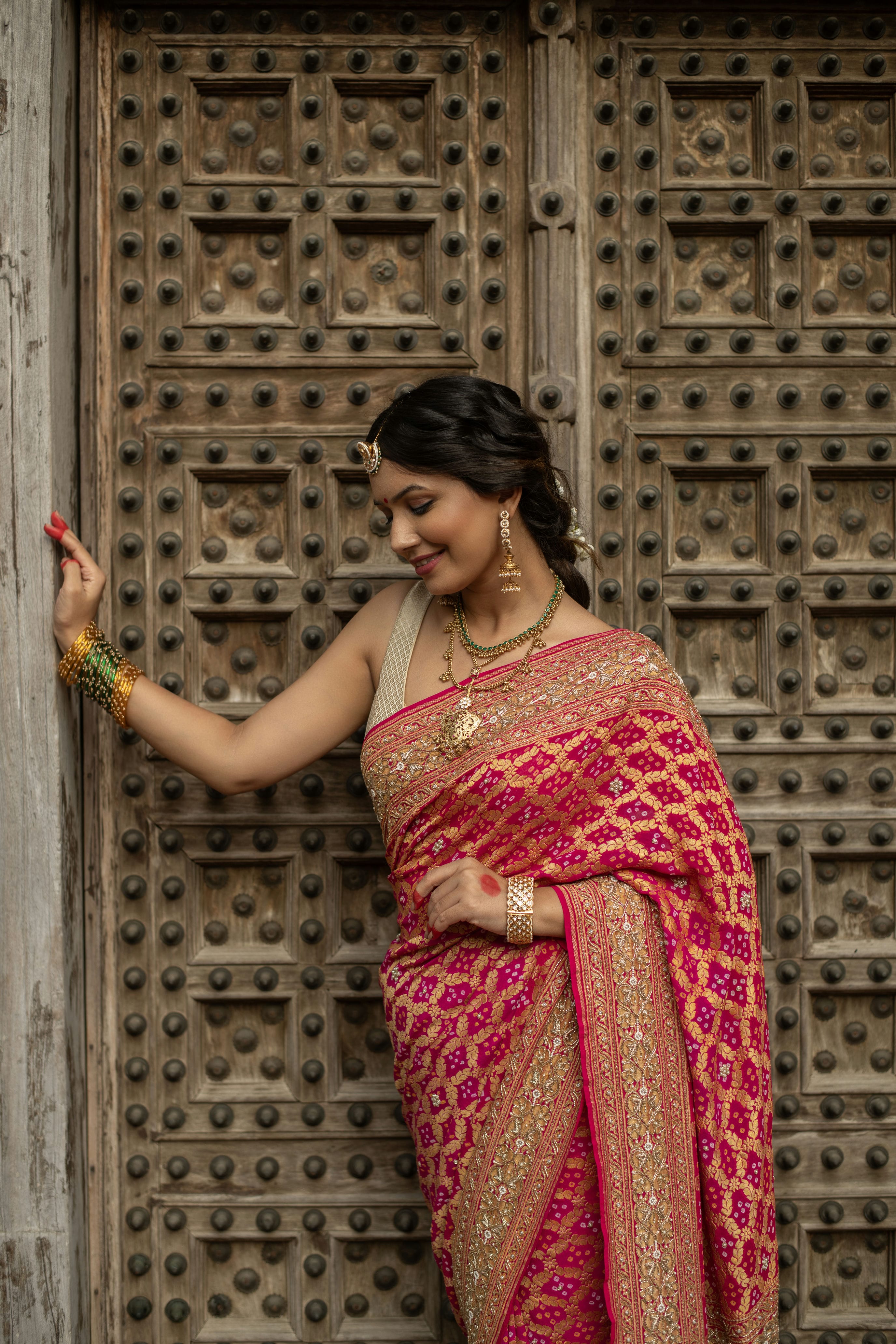 Radiant Banarasi Georgette Bandhani Gharchola Saree with Exquisite Hand Embroidery