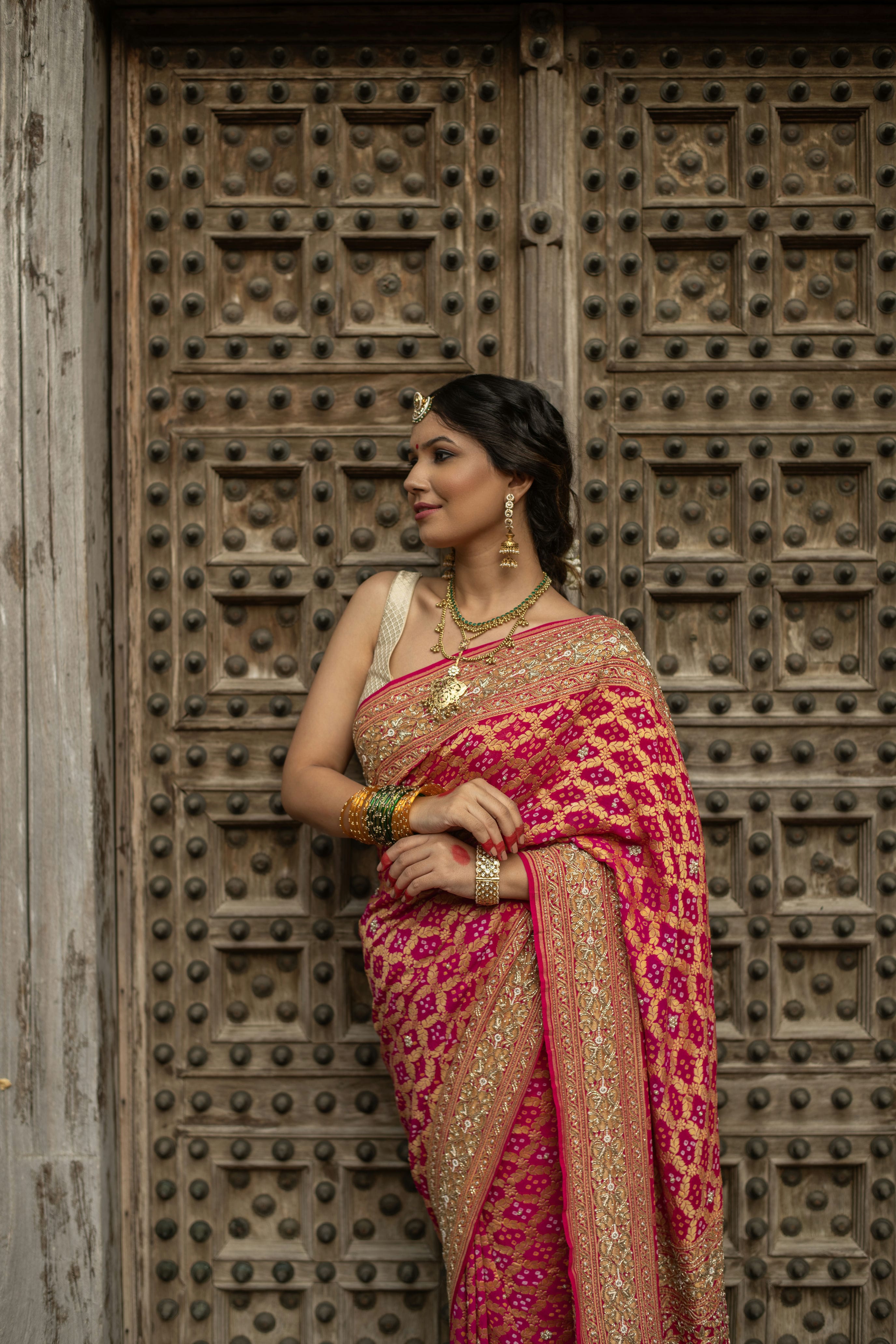 Radiant Banarasi Georgette Bandhani Gharchola Saree with Exquisite Hand Embroidery