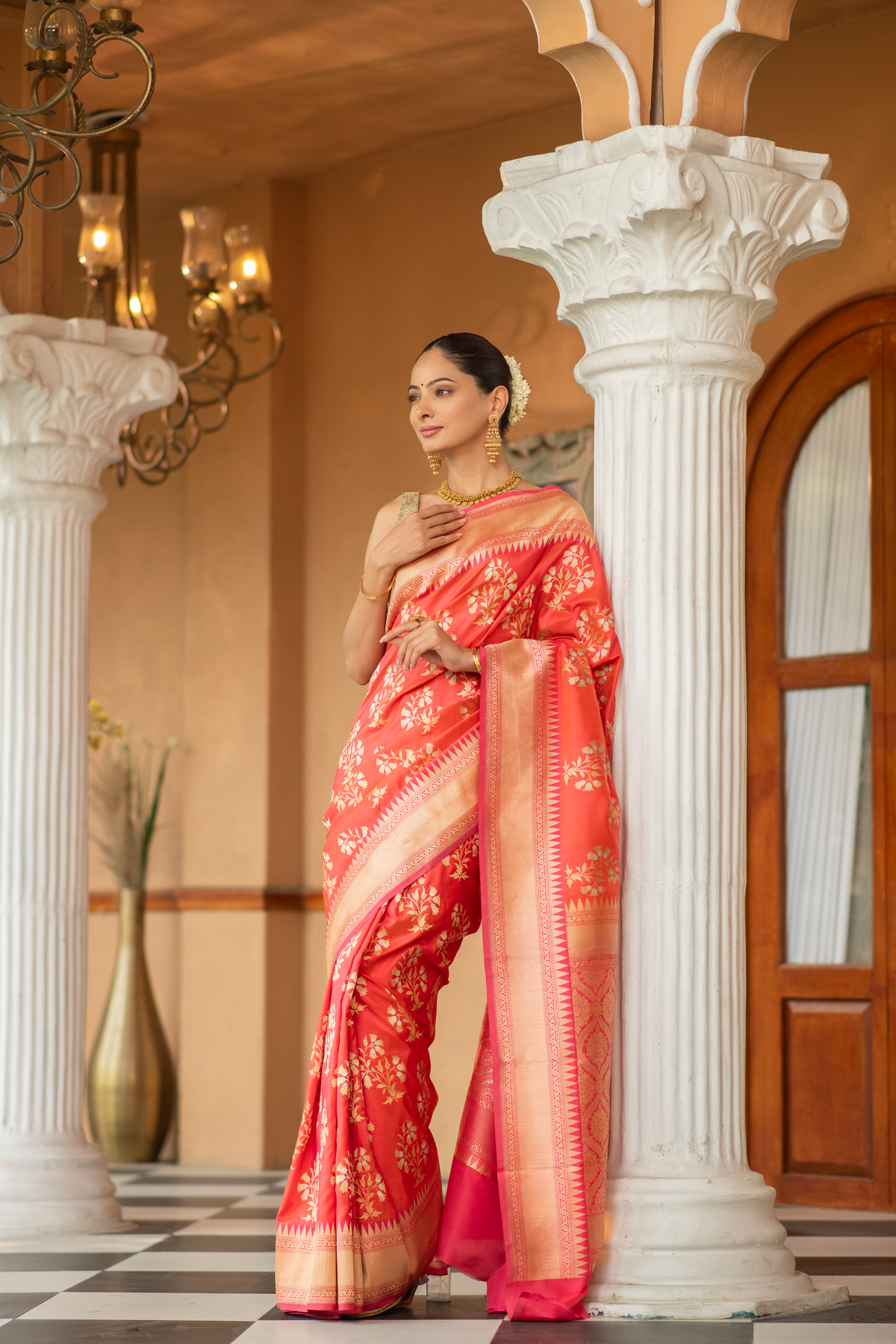 Padmaruchi (Peach Floral Katan Silk Saree)
