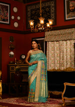 Nityashri (Turquoise Meenakshi Kora Saree)
