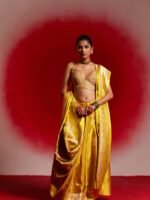 Ambika (Yellow Kadwa Mushru Meena Boota Saree)